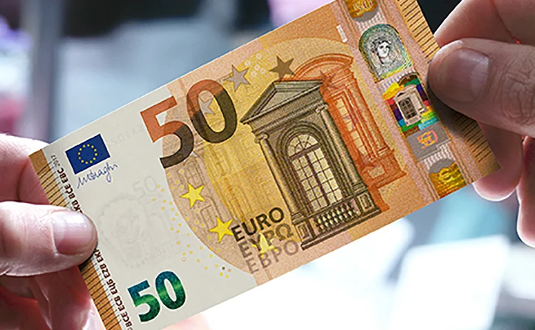 Two hands holding the new €50