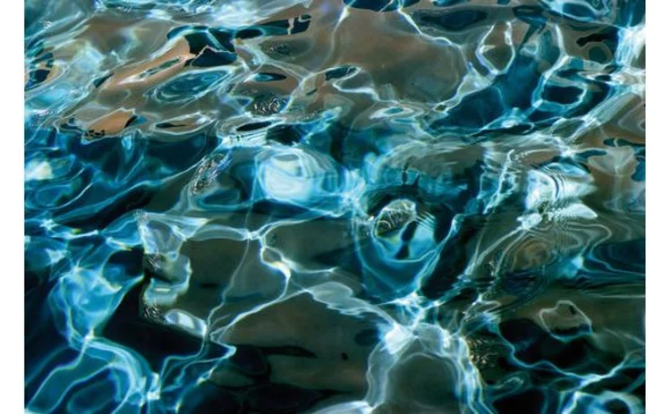 rippled-surface-of-blue-pool-of-water