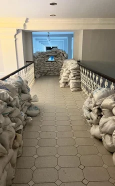 Gallery with sandbag barricades for defence