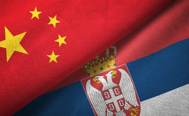 The flags of China and Serbia