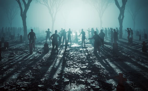 Zombies lurching through a graveyard