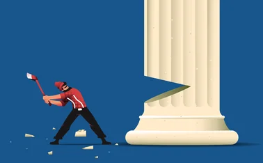 A man chopping at a pillar with an axe