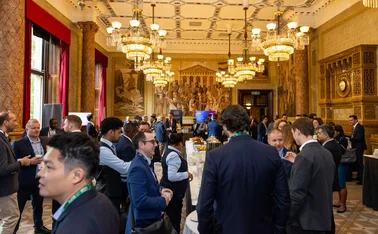 A group of people socialise at the Central Banking London Meetings 2026