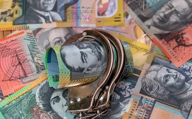 Australia dollar and handcuffs