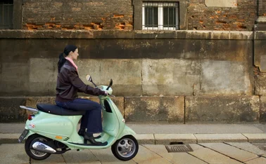 Italian woman on a scooter