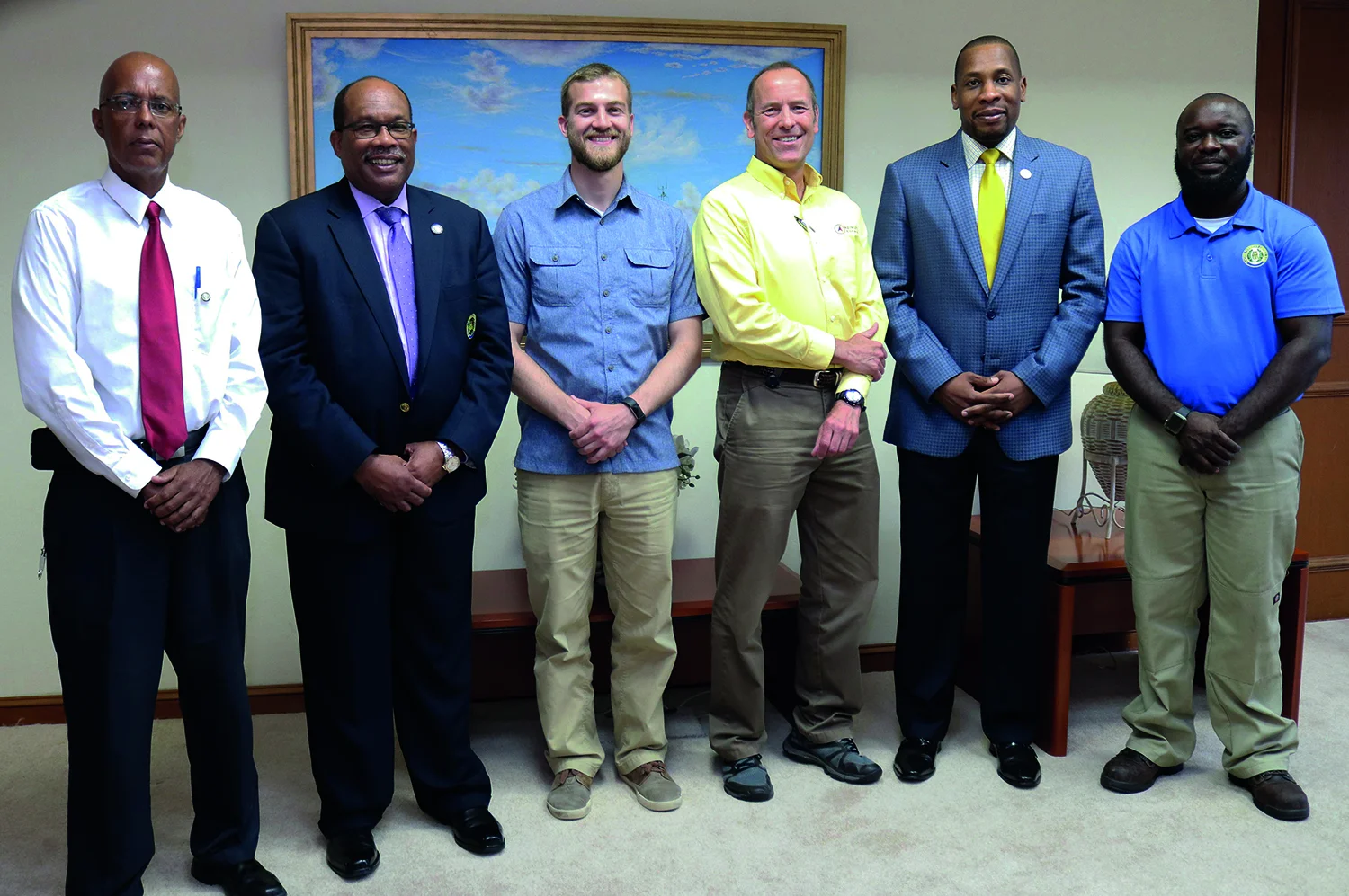 L to R: Wayne Myers and Trevor Brathwaite (ECCB); Daniel Stroth and Marc Lopata (Azimuth); governor Timothy Antoine and Jevon Wilkins (ECCB), May 23, 2018