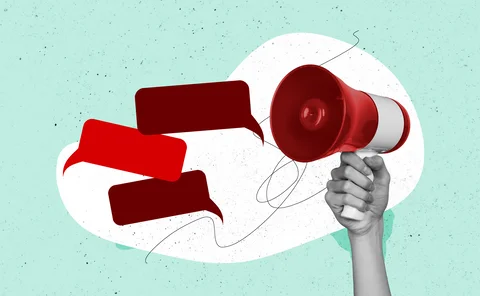 Speech bubbles and a hand holding a megaphone pop art style