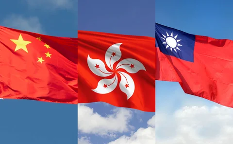 Left to right: the flags of China, Hong Kong, and Taiwan