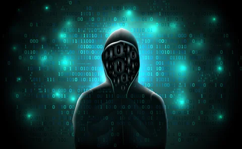 Silhouette of a hacker in a hoodie made up of binary code