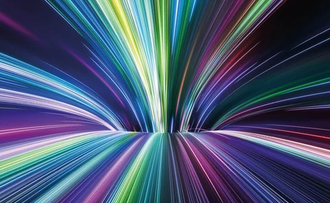 A series of lines in blue, green, pink and purple, curving into another line