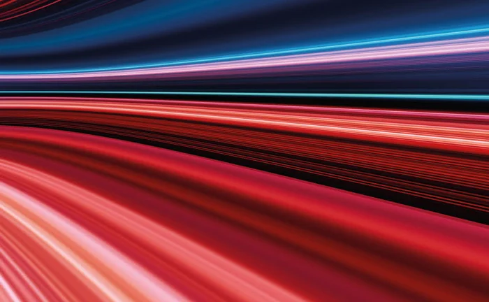 Red, blue and purple lines all converging on a bend