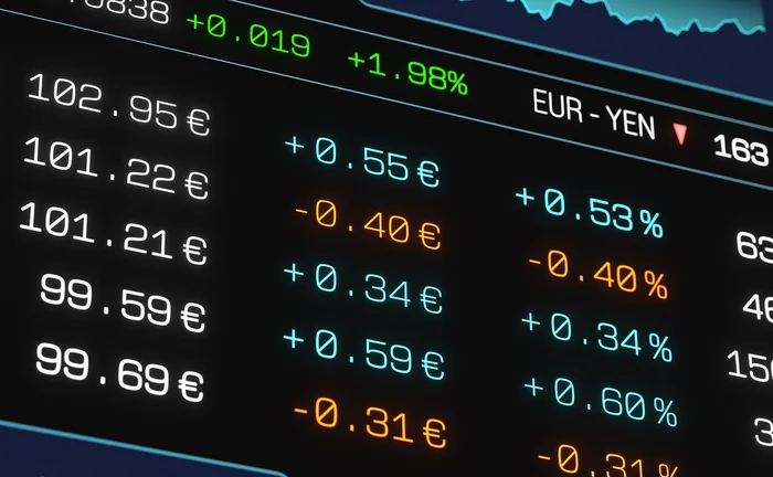 Financial market data screen displaying European government bond yields, currency exchange rates and market price movements in coloured figures.