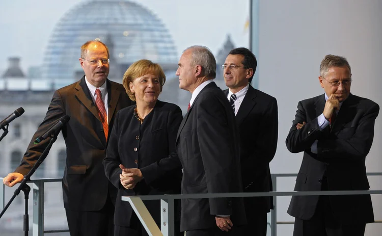 L to R: Peer Steinbrück, Angela Merkel and Otmar Issing
