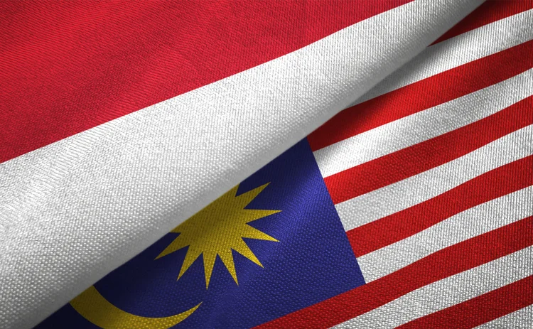 The flags of Indonesia and Malaysia