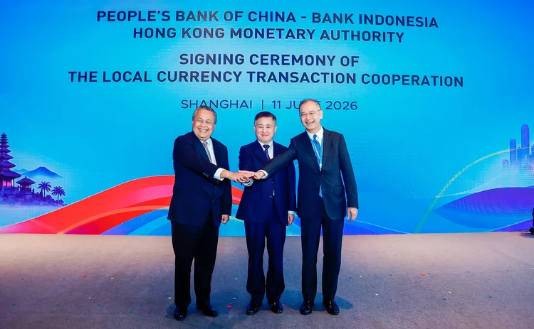 Perry Warjiyo, Pan Gongsheng, and Eddie Yue in Shanghai on June 11, 2026. 