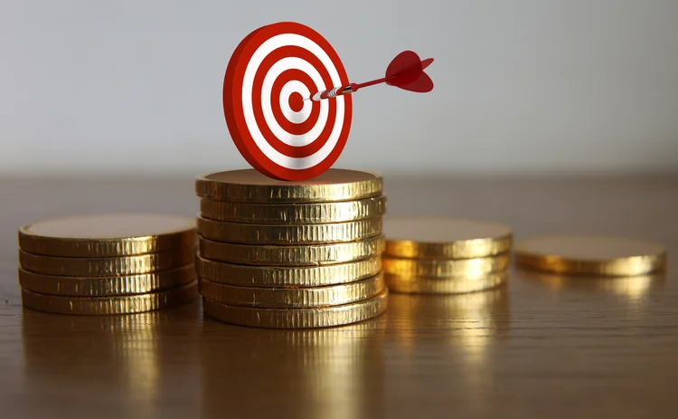 Coins and a bullseye target 