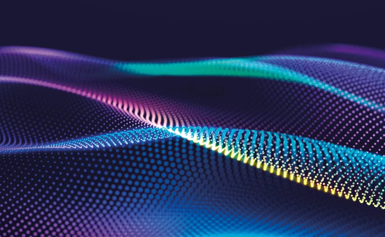 An abstract wave pattern of coloured dots