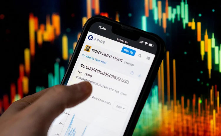 Trump meme coin status shown on a mobile phone