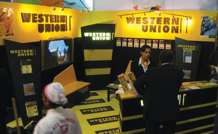 People at a Western Union stand