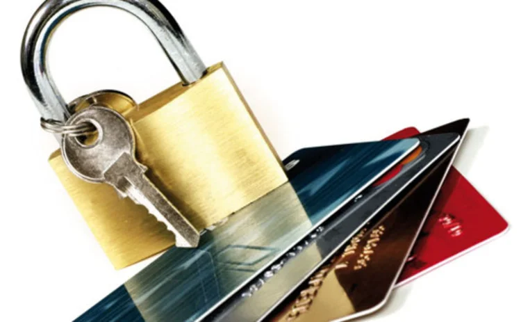 A padlock on a number of credit cards