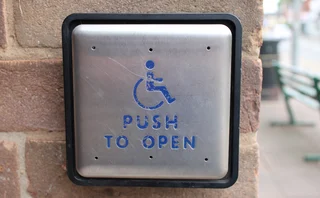 Push to open sign with wheelchair icon