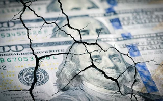 earthquake-like cracks across dollar notes