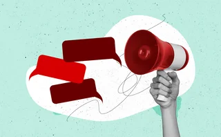 Speech bubbles and a hand holding a megaphone pop art style