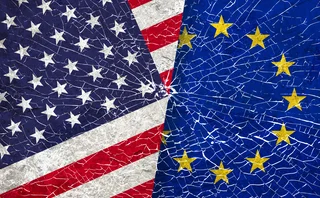 EU US conflict under smashed glass