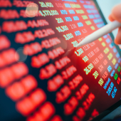 Digital screen with red numbers signifying a financial crisis