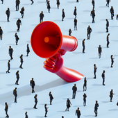 Hand holding large red megaphone in a crowd of people