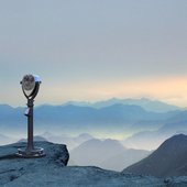 Telescope At Edge Of Cliff Looking Out At Dramatic Landscape